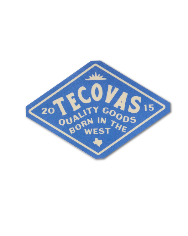 Blue diamond-shaped Tecovas logo with "Quality Goods Born in the West" and "2015" text. Includes a small Texas silhouette.