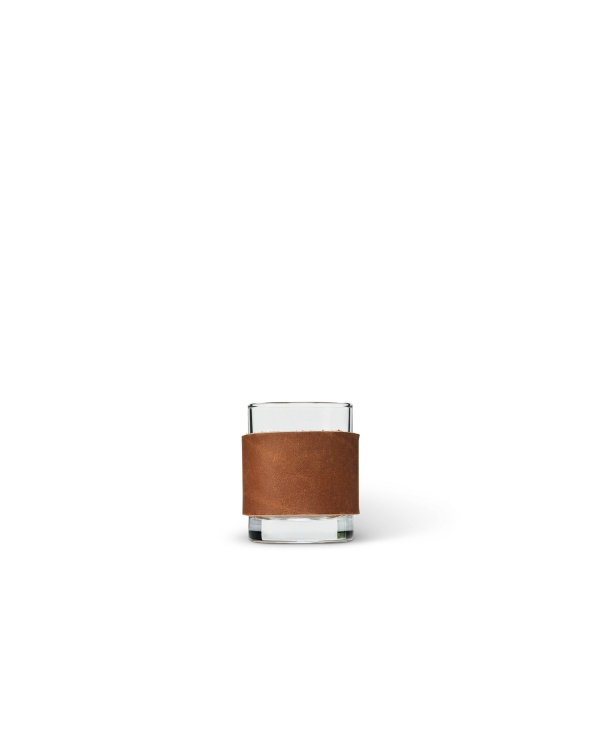 Front view of Leather Tasting Glass - Brown on plain background