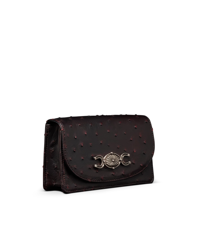 Quarterfront view of Concho Chain Crossbody - Black Cherry on plain background