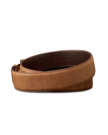 A brown leather belt with a suede finish, coiled and showing the embossed word "Tecovas" on the inner side.