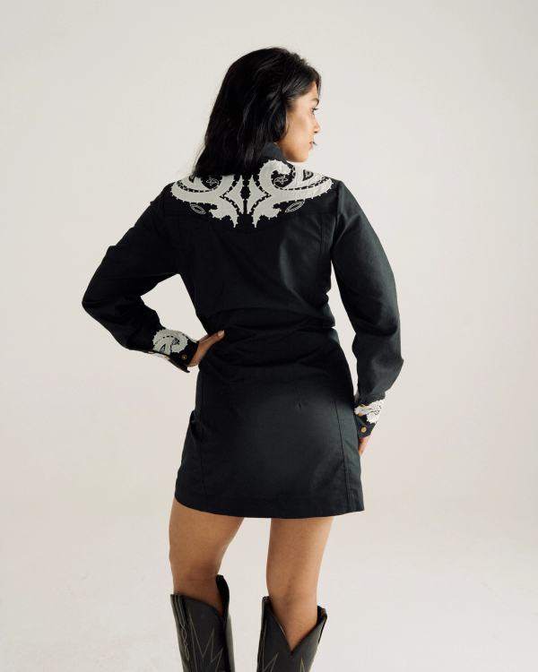 Back view of Women's L/S Applique Mini Dress - Black on model