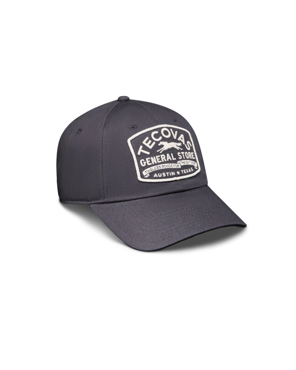 Quarterfront view of General Store Dad Hat - Washed Navy on plain background
