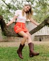 Woman in sequoia brown cowgirl boots