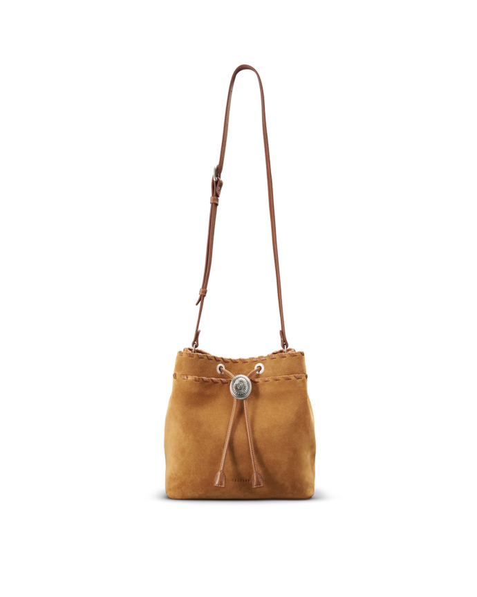 A small brown suede bucket bag with a silver button, leather drawstring closure, and an adjustable shoulder strap on a white background.