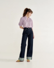 Full view of Women's Split Neck Top - Purple on model