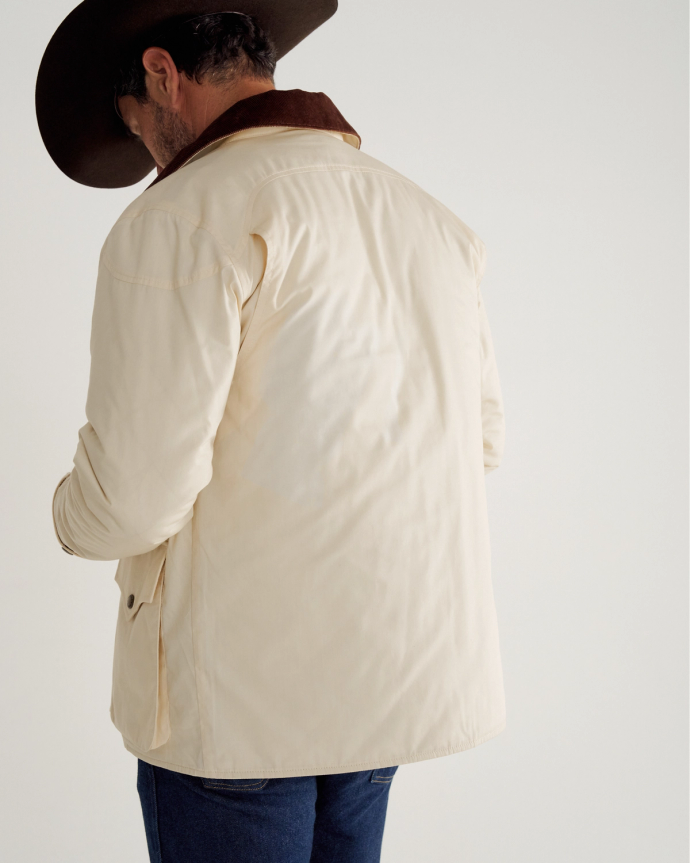 Back view of Men's Ranch Coat - Ivory / Saddle on model