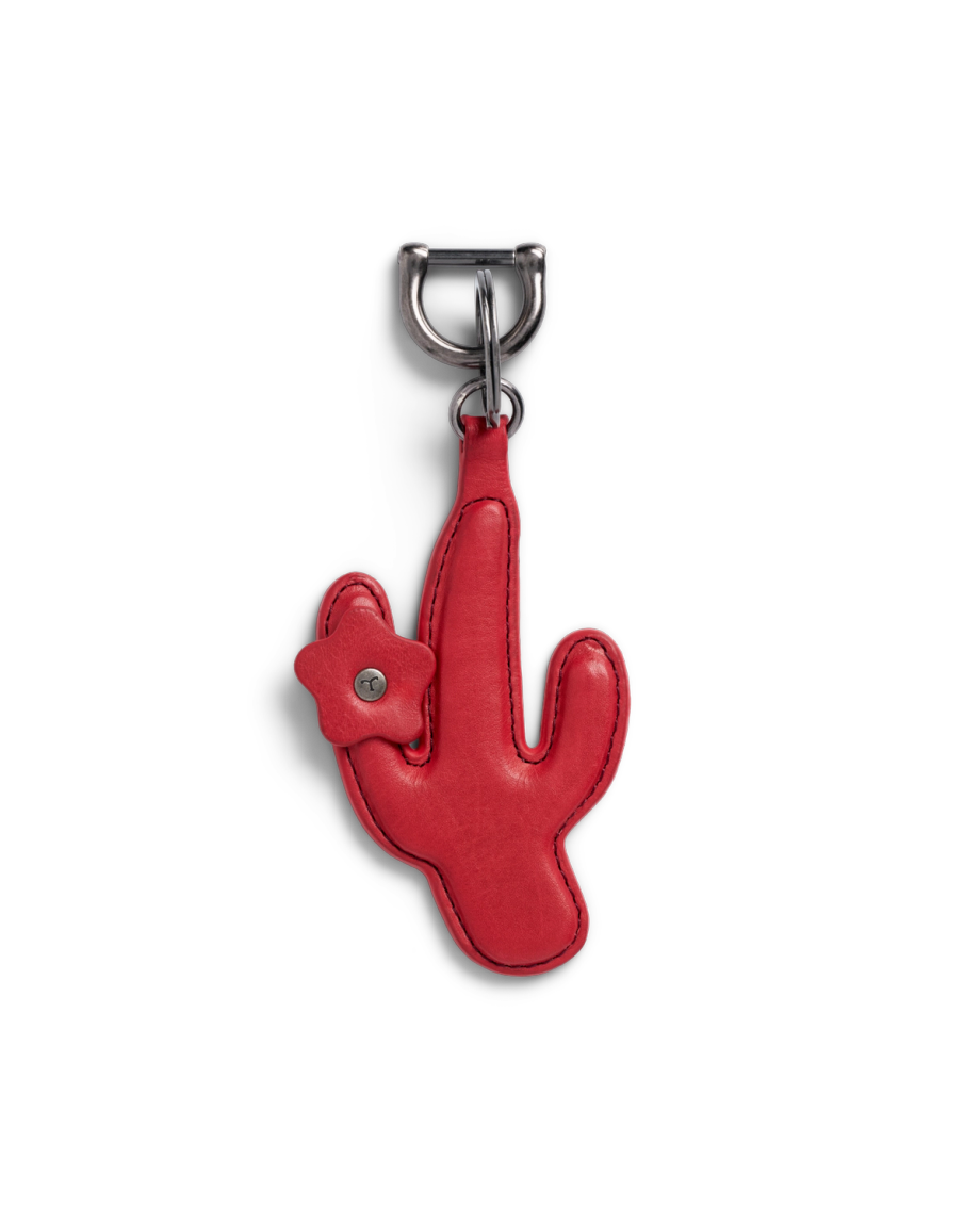 A red cactus-shaped leather keychain with a small flower detail, attached to a silver metal clasp.