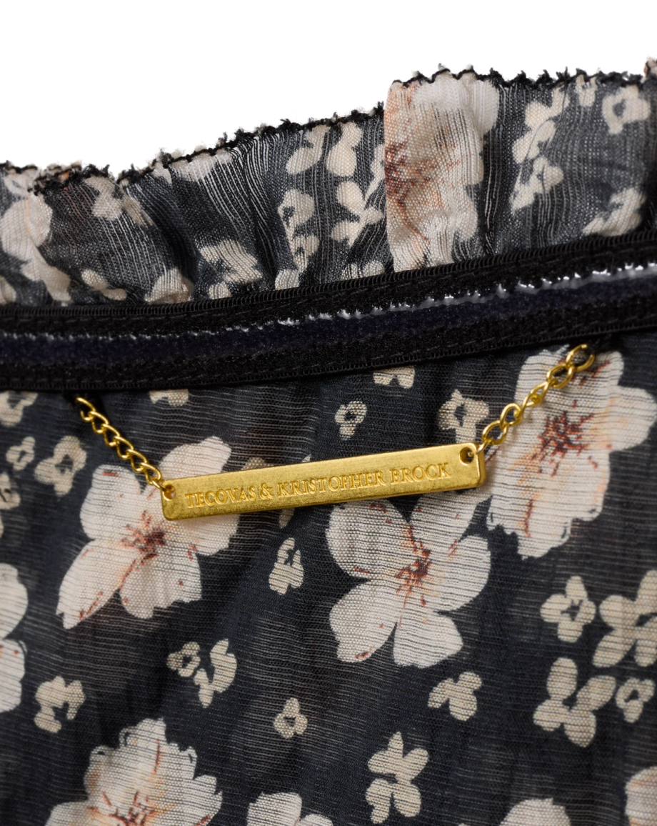 Tag view of The Willow Dress by Kristopher Brock - Black/Beige Floral on plain background