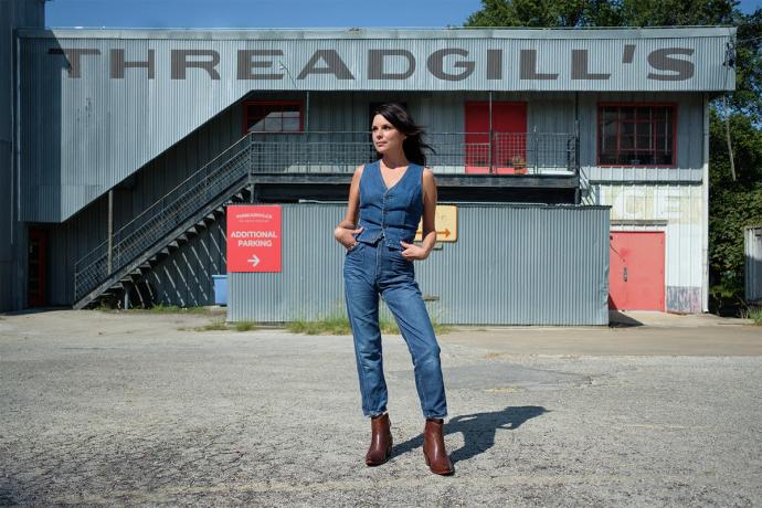 whitney in denim outside Threadgill's