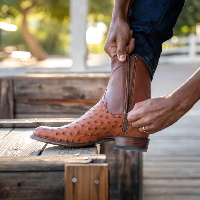 close up of Dean Pecan Brown Zip Cowboy Boot on a man's feet 