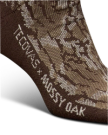 Close-up of a brown sock with a camouflage pattern and the text "TECOVAS x MOSSY OAK" knitted into the fabric near the ankle.