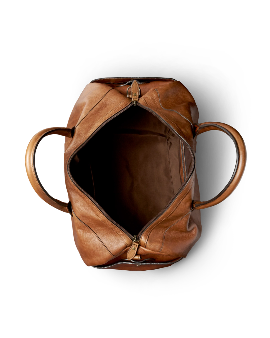 Front view of Lightweight Leather Duffle - Heritage Tan on plain background