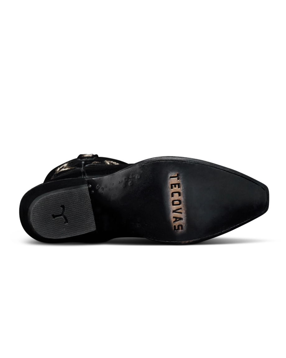 Sole view of The Annie Flame - Midnight / Bone Patent Goat / Python on plain background