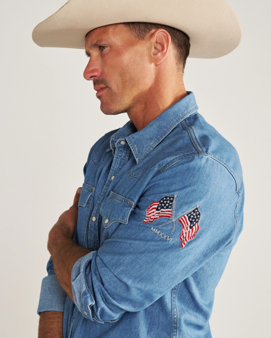 Closeup detail view of Men's Denim Pearl Snap LS - Turquoise / Multi