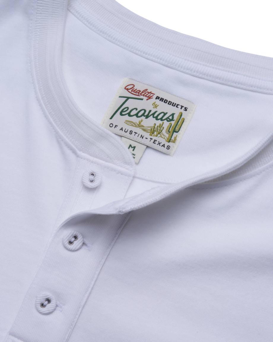 Closeup of the men's short sleeve henley in white