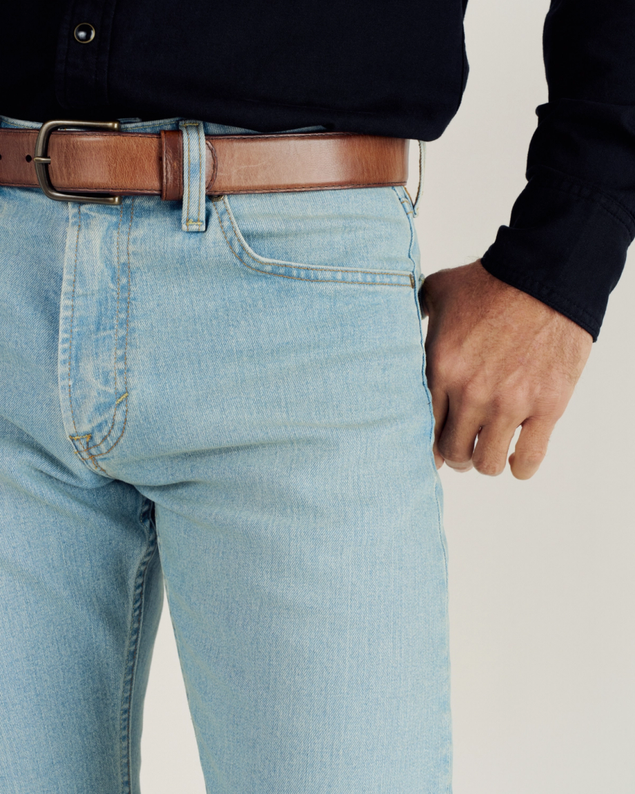 Closeup detail view of Men's Slim Straight Stretch Denim - Light Stone Wash