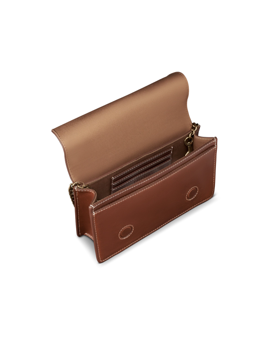 Front view of Concho Chain Crossbody - Saddle on plain background