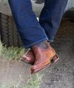 Man wearing the Wade Russet Brown Cowboy Boots
