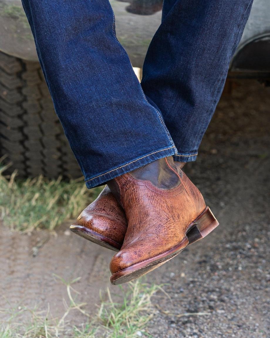 Man wearing the Wade Russet Brown Cowboy Boots