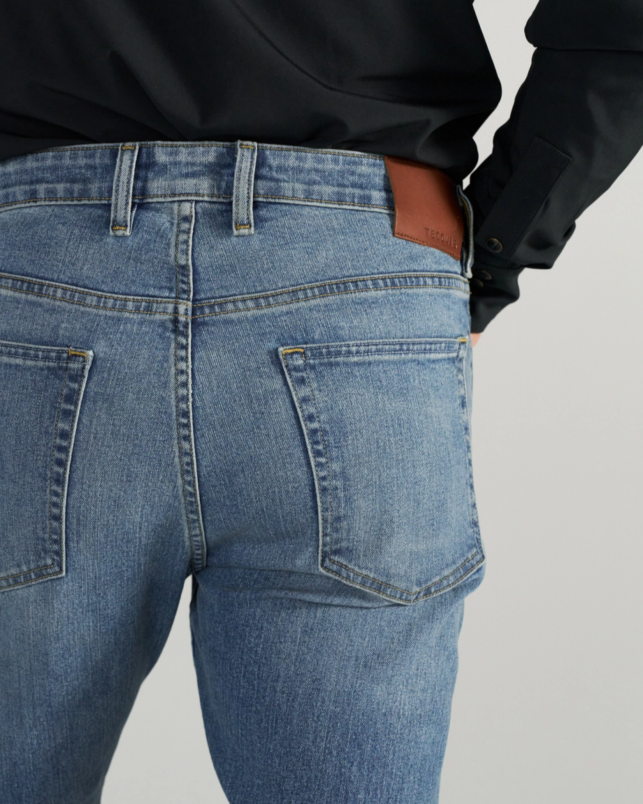 Closeup view of Men's Slim Straight Stretch Denim - Medium Light