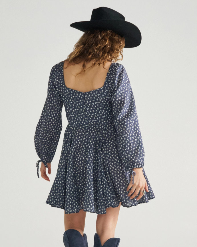 Back view of Women's L/S Mini Dress - Navy / Bone on model