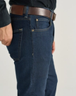 Front view of Men's Slim Straight Stretch Denim - Dark Indigo on model