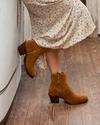 woman in tan sienna suede zip cowgirl booties