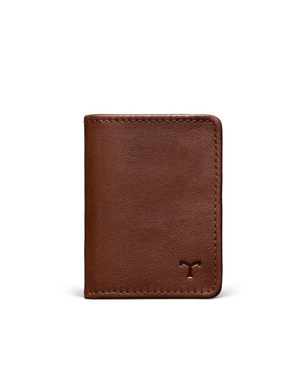 Brown leather wallet with a minimalist design, featuring a small embossed logo on the bottom right corner, set against a black background.