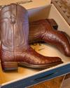 close up picture of Wyatt mahogany boots in a shipping box