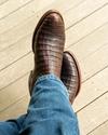 close up picture of Cole Mahogany brown cowboy boots on a man's feet