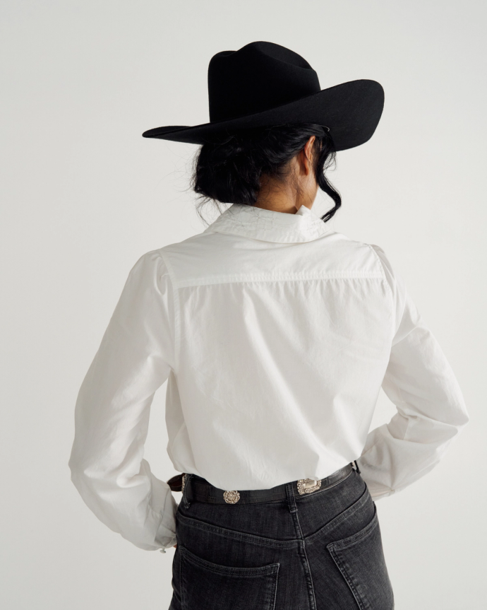Back view of Women's L/S Embroidered Cotton Popover Top - White on model