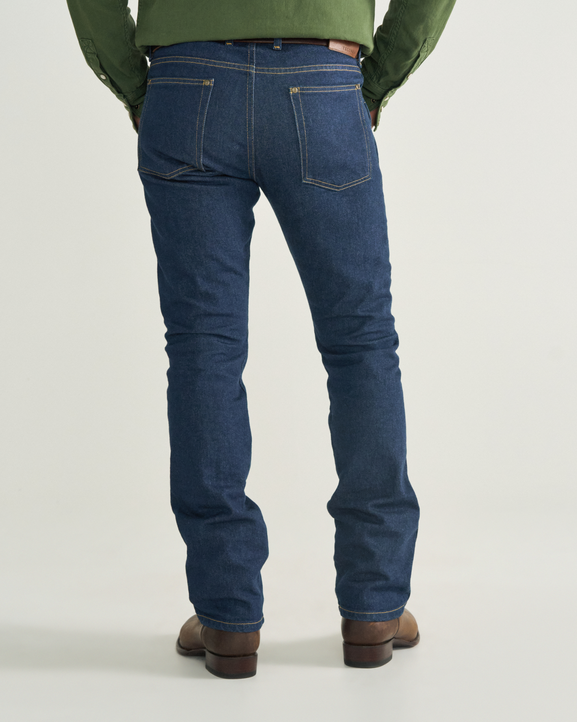 Back view of Men's Slim Straight Heritage Denim - Dark Blue on model