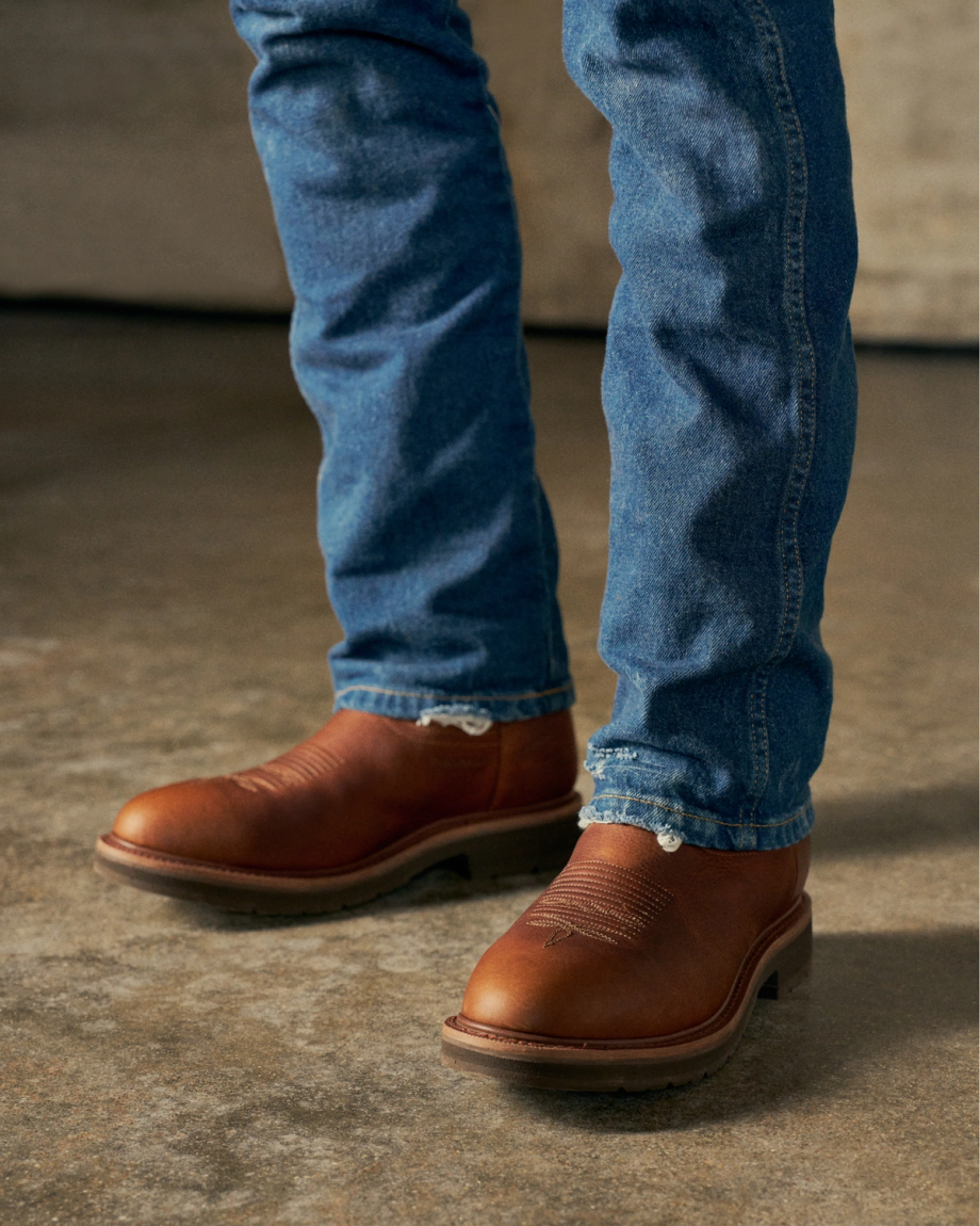 Toe view of The LH WP Round Comp Toe Work Boot - Saddle Cowhide on plain background