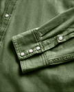 Closeup detail view of Men's Denim Long Sleeve Pearl Snap - Hunter Green