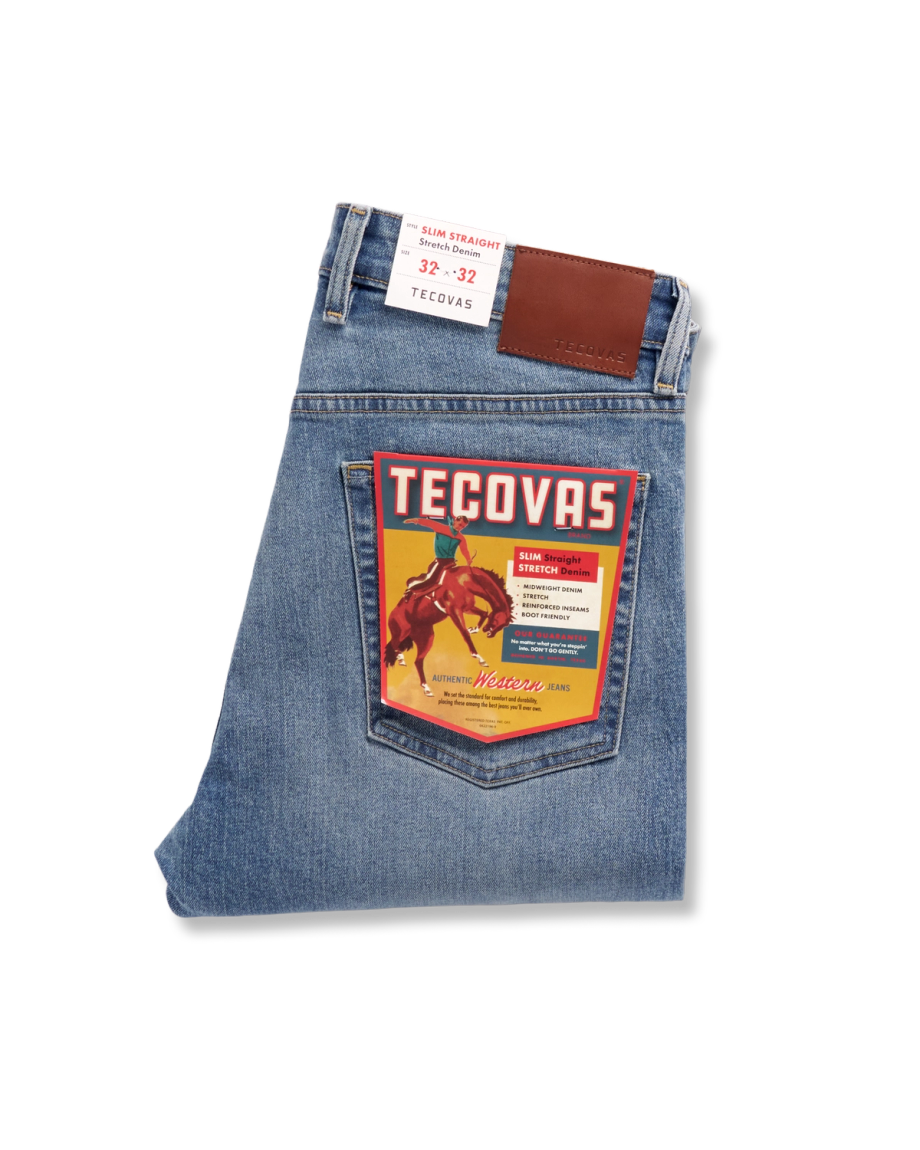 Folded view of Men's Slim Straight Stretch Denim - Medium Light on plain background