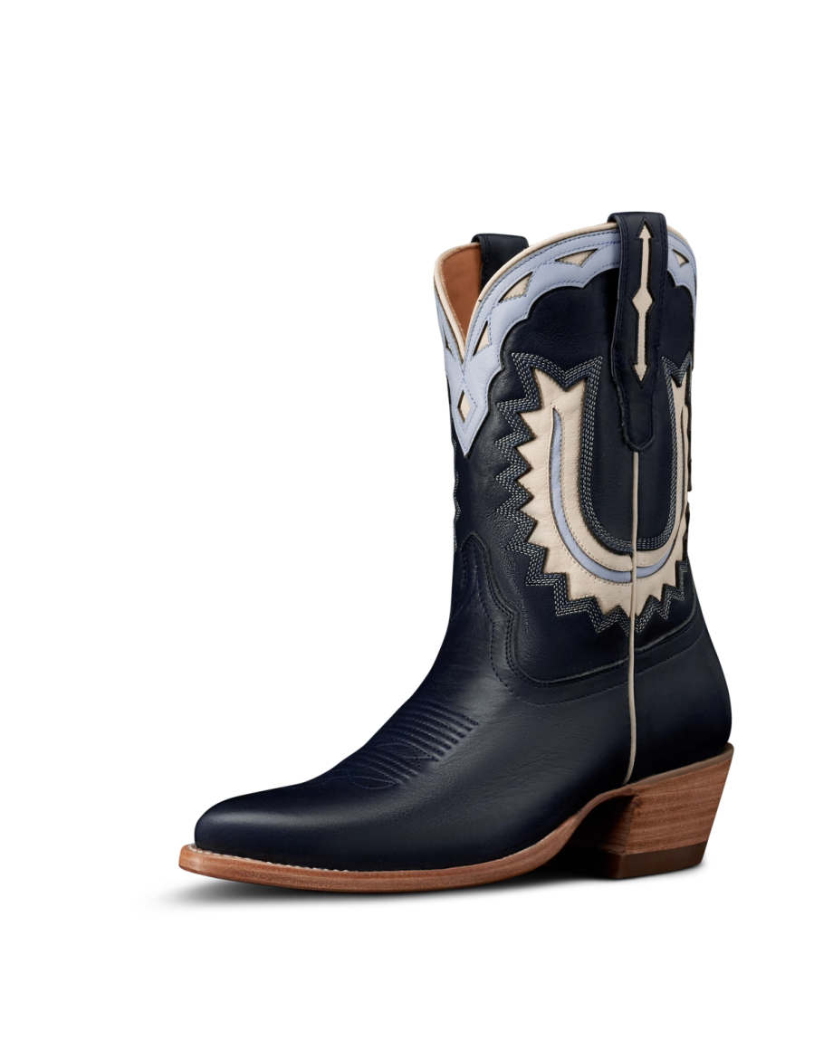 Quarterfront view of The Jolene - Atlantic Blue/Chambray Cowhide on plain background
