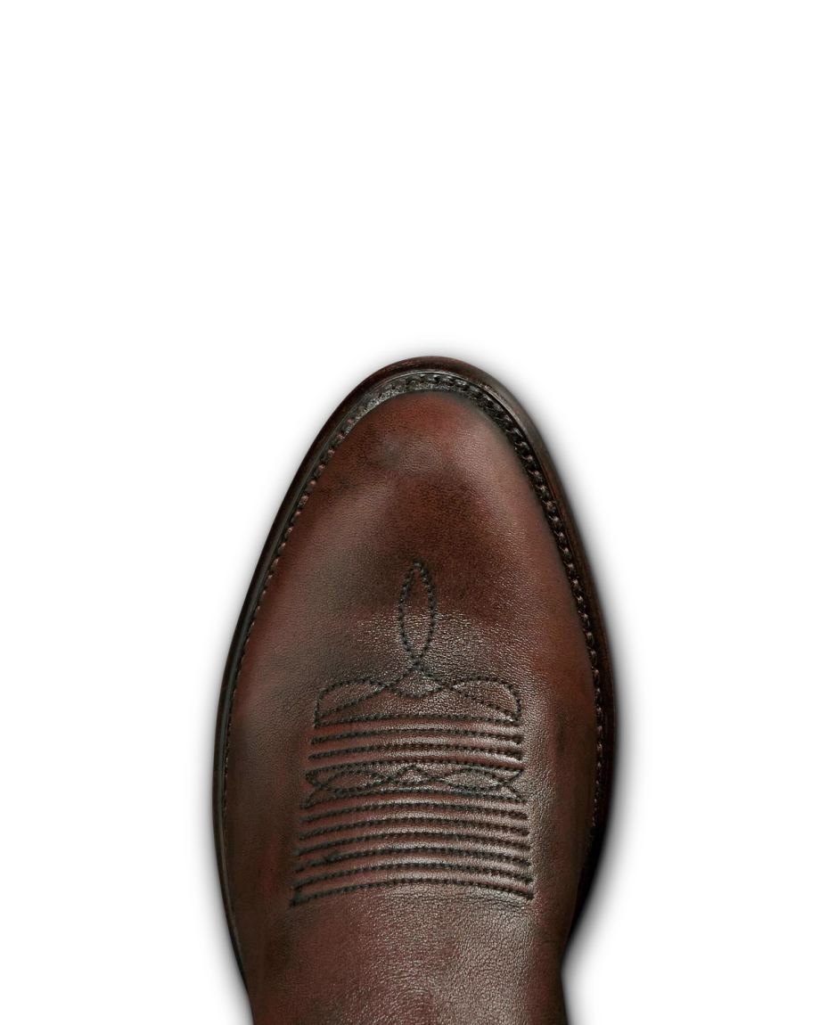 Toe view of The Cartwright - Iced Tea Cowhide on plain background