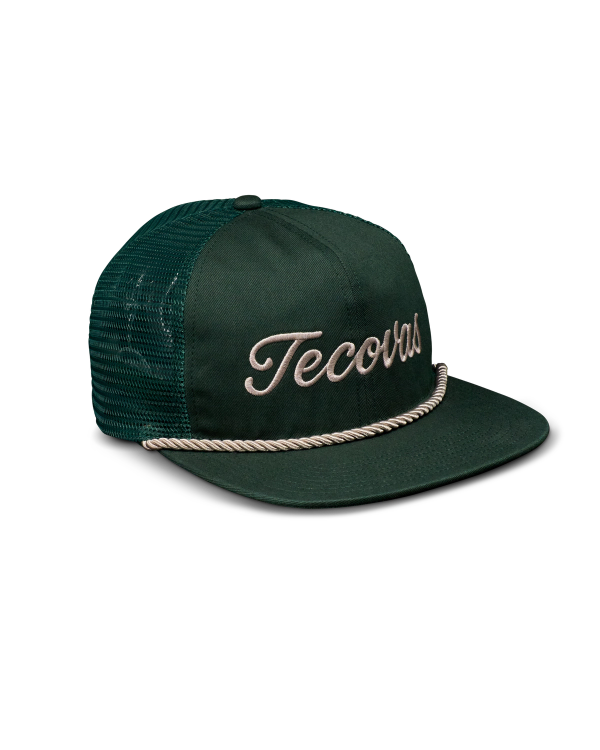 Quarterfront view of Tecovas Flat Brim Trucker - Dark Green on plain background