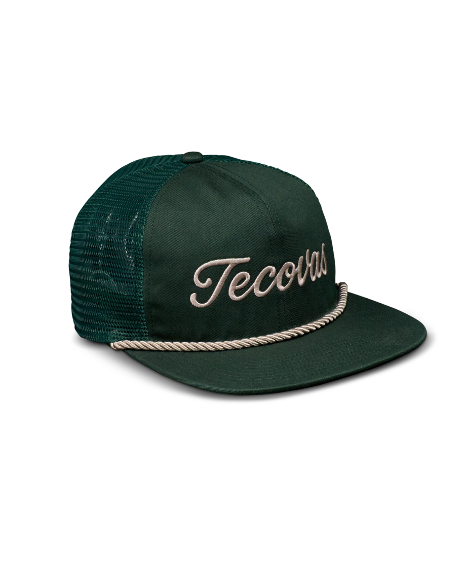 Quarterfront view of Tecovas Flat Brim Trucker - Dark Green on plain background