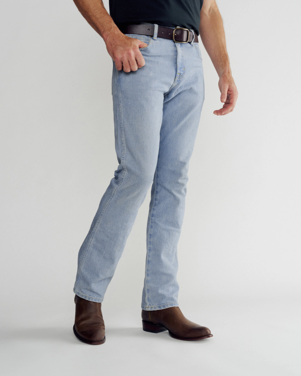 Front view of Men's Slim Straight Heritage Denim - Light Blue on model