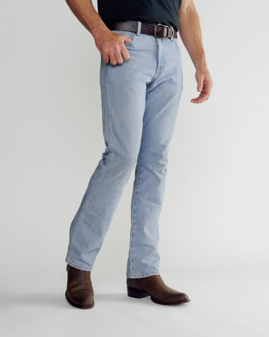 Front view of Men's Slim Straight Heritage Denim - Light Blue on model