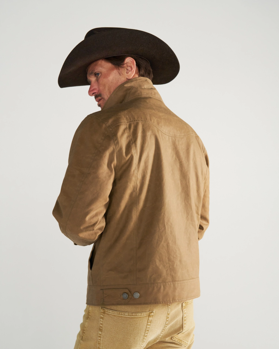 Back view of Men's Waxed Ranch Jacket - Field Tan on model