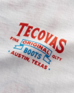 Closeup detail view of Men's Armadillo Cowboy Tee - Bone/Orange/Blue