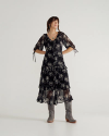 Full view of Women's Elbow-Length Maxi Dress - Black / White on model