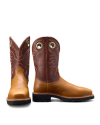 A pair of cowboy boots with brown leather shafts and tan leather feet, featuring decorative stitching and pull holes.