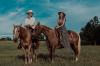 Kristopher Brock and Kaitlynn Carter riding horses
