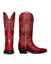 Two red cowboy boots with intricate stitching. One boot is shown from the front and the other from the side, displaying a pointed toe and a low heel, set against a black background.