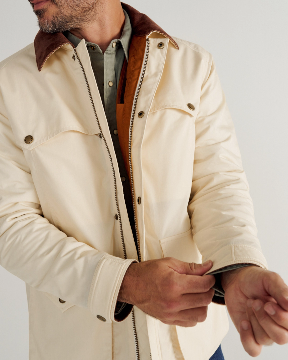 Front view of Men's Ranch Coat - Ivory / Saddle on model
