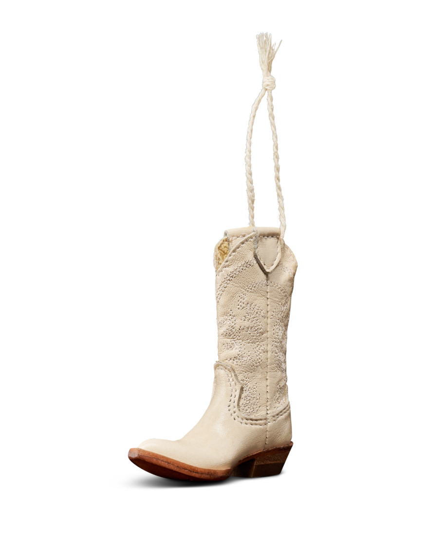A single cream-colored cowboy boot with decorative stitching and a rope loop attached to the top, shown against a plain white background.