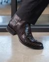 close up of Cooper Black Cherry Cowboy Boot on a man's feet 